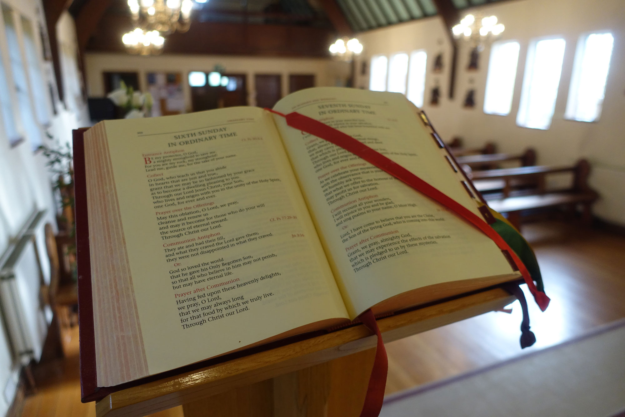 The lectionary open on the lectern at Holy Cross